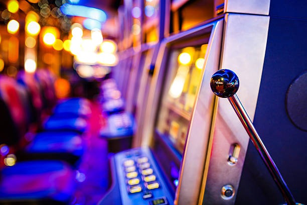 Mobile phone displaying kaostogel slot Free Play account dashboard with practice balance and game categories